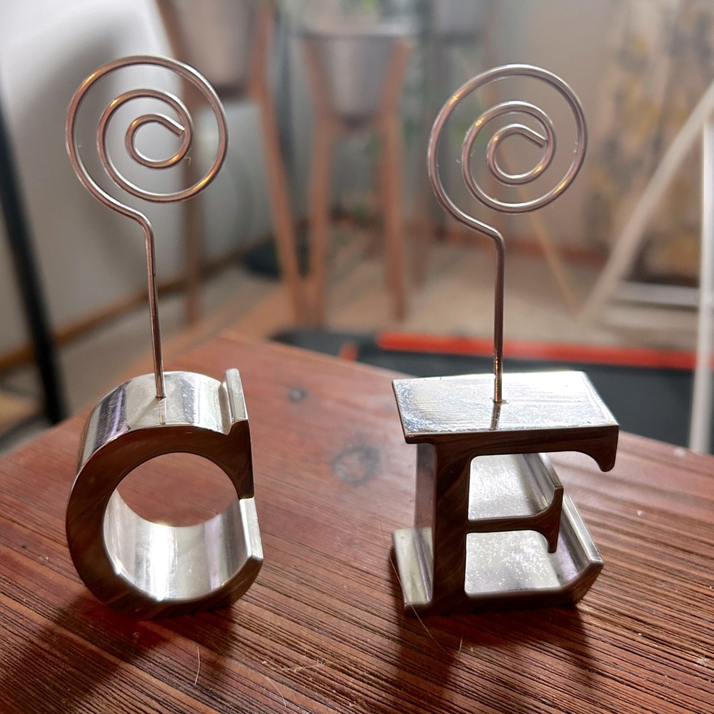 “C” and “E” small photo holders, silver, no damage, next to bottle show size